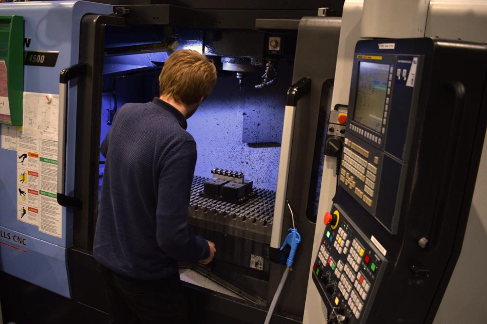 CNC miller working with CNC milling machine